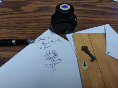 picture of fountain pen, ink, stationery