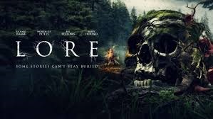 Movie poster for Lore (2023), with a skull in the foreground, partly covered by plants. In the background is a forest, a fire, and what appears to be a line of white-clad figures.